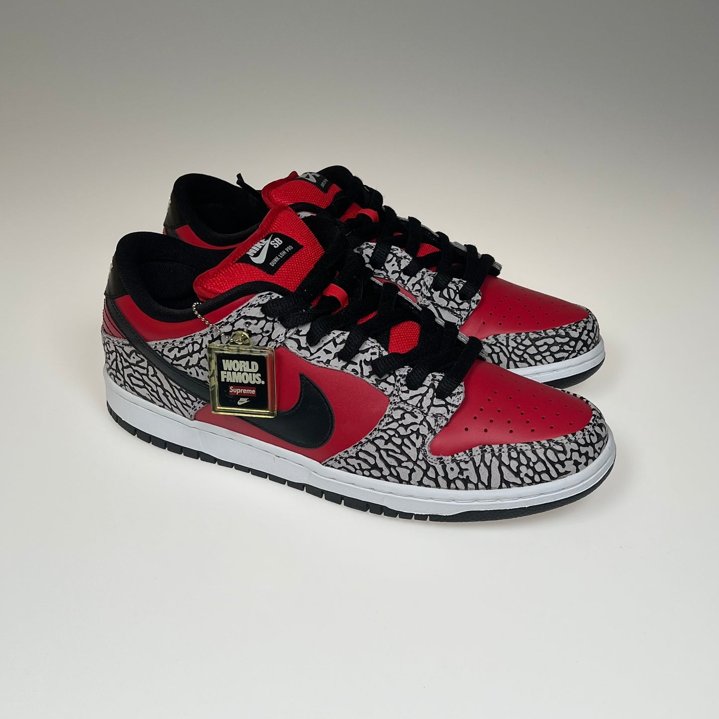 Nike SB Dunk Low x Supreme 'Red Cement'
